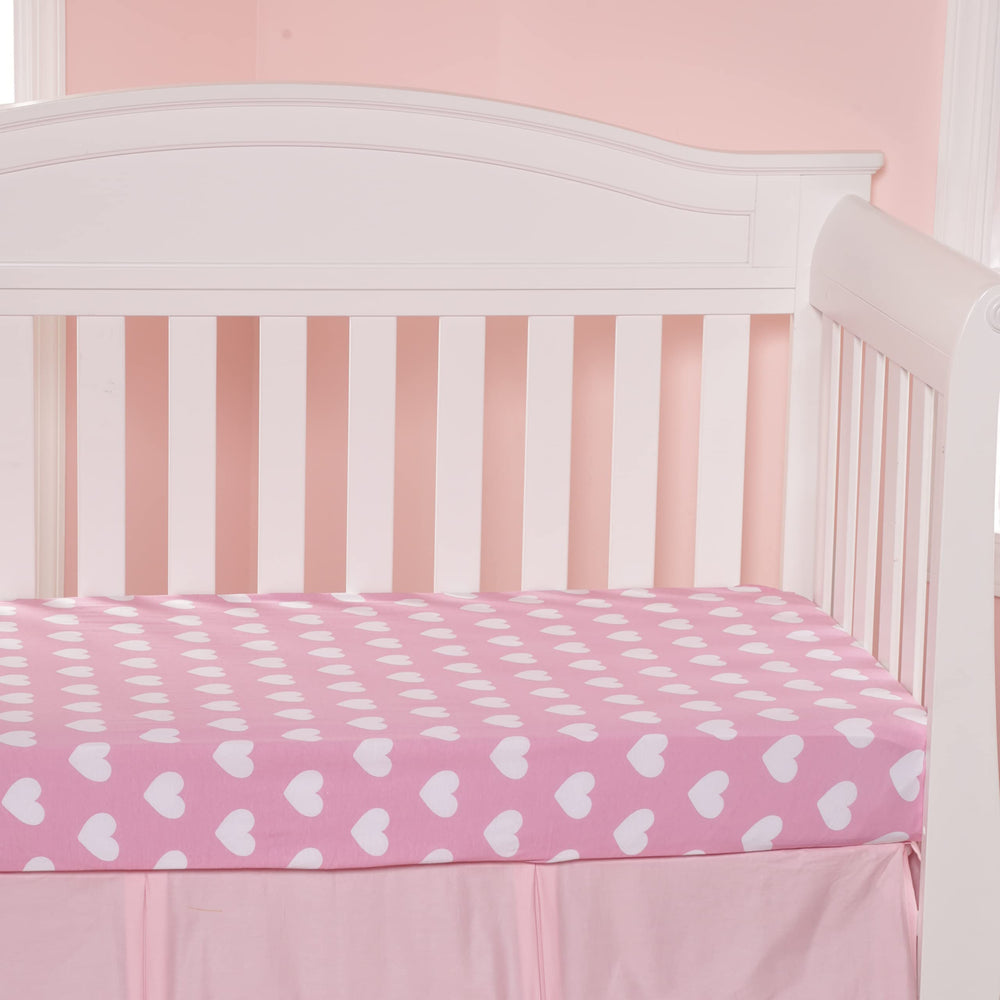 Everyday Kids folded sheets in a bright nursery demonstrate easy swaps