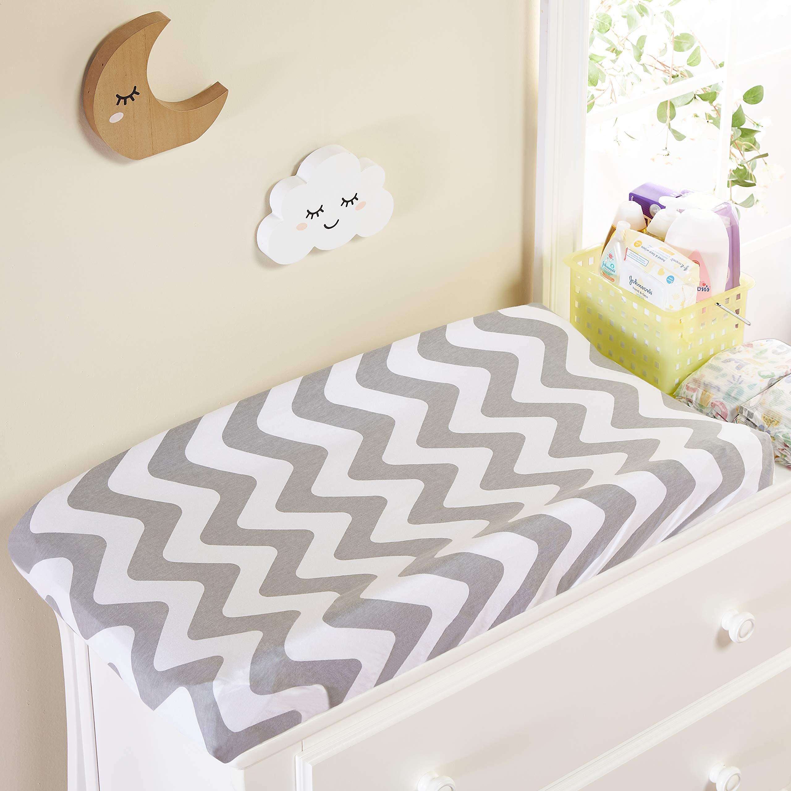 Everyday Kids cover with elastic edges stays in place during diaper changes.