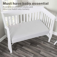 Everyday Kids fitted crib sheets with full elastic trim for secure mattress fit.