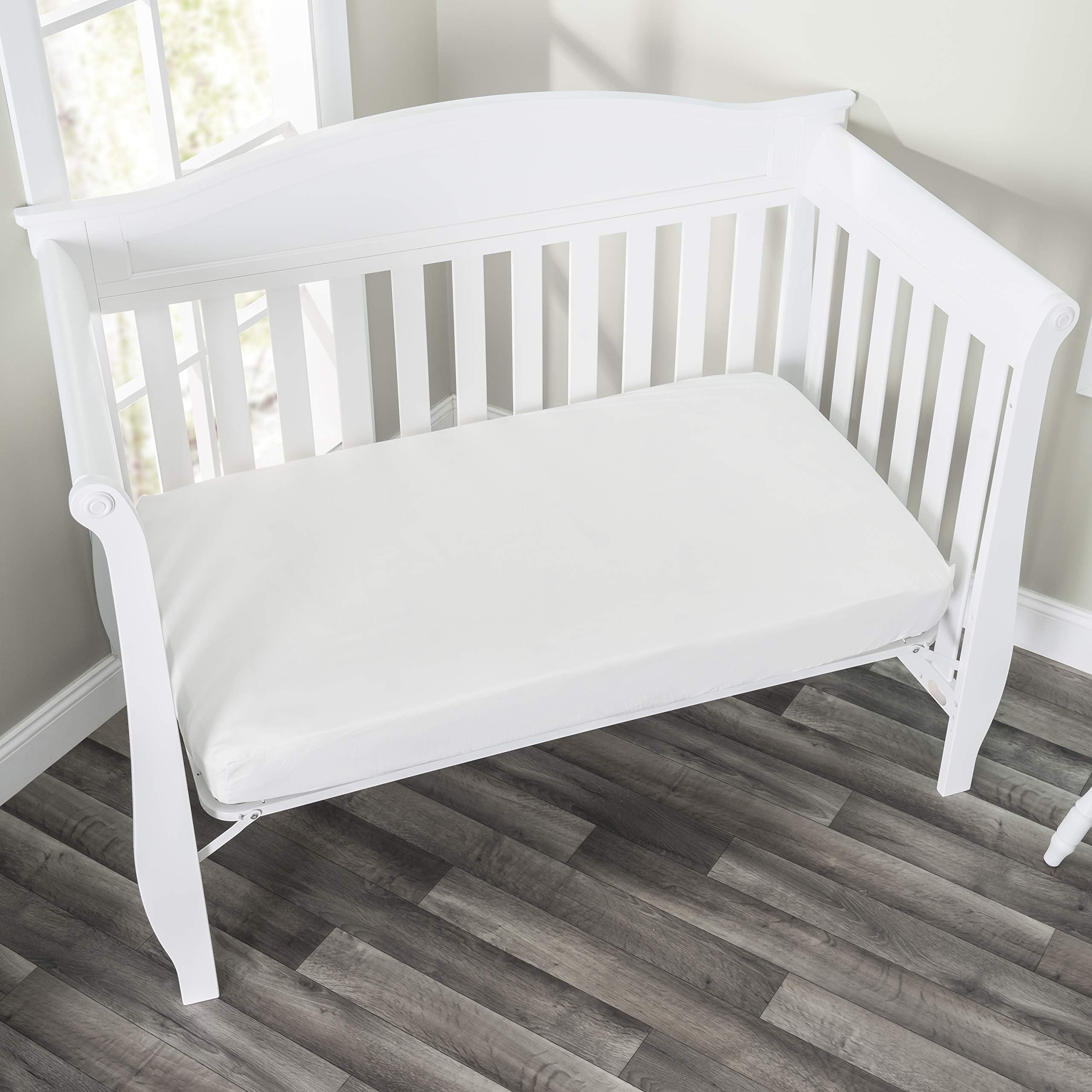 Everyday Kids fitted sheet elastic trim four sides demonstrates secure crib fit