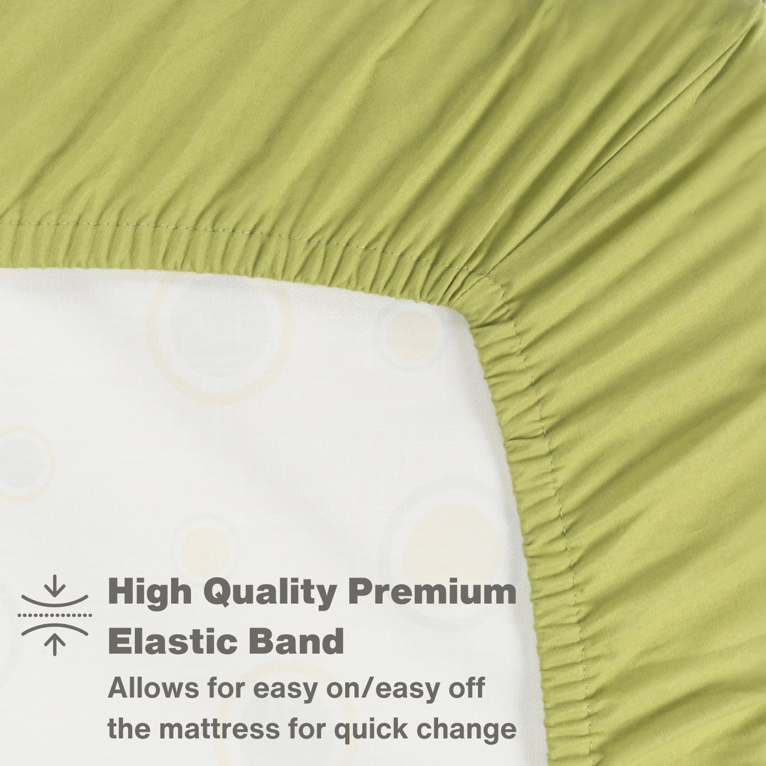 Everyday Kids fitted crib sheet on crib demonstrates color variety for nursery mix-and-match.
