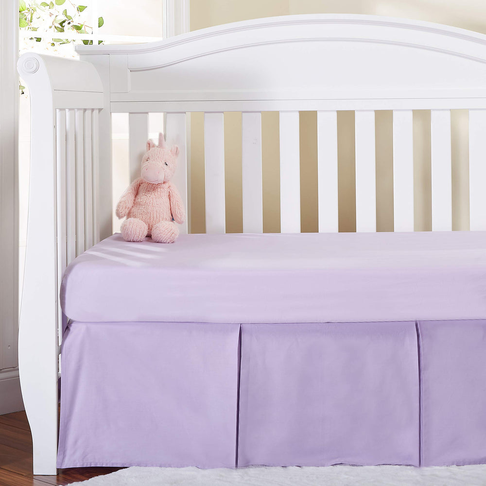 EVERYDAY KIDS Lavender crib skirt close-up shows cotton ruffles for gentle baby comfort.