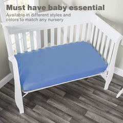 Everyday Kids light blue nursery sheet adds calm color to crib setup.