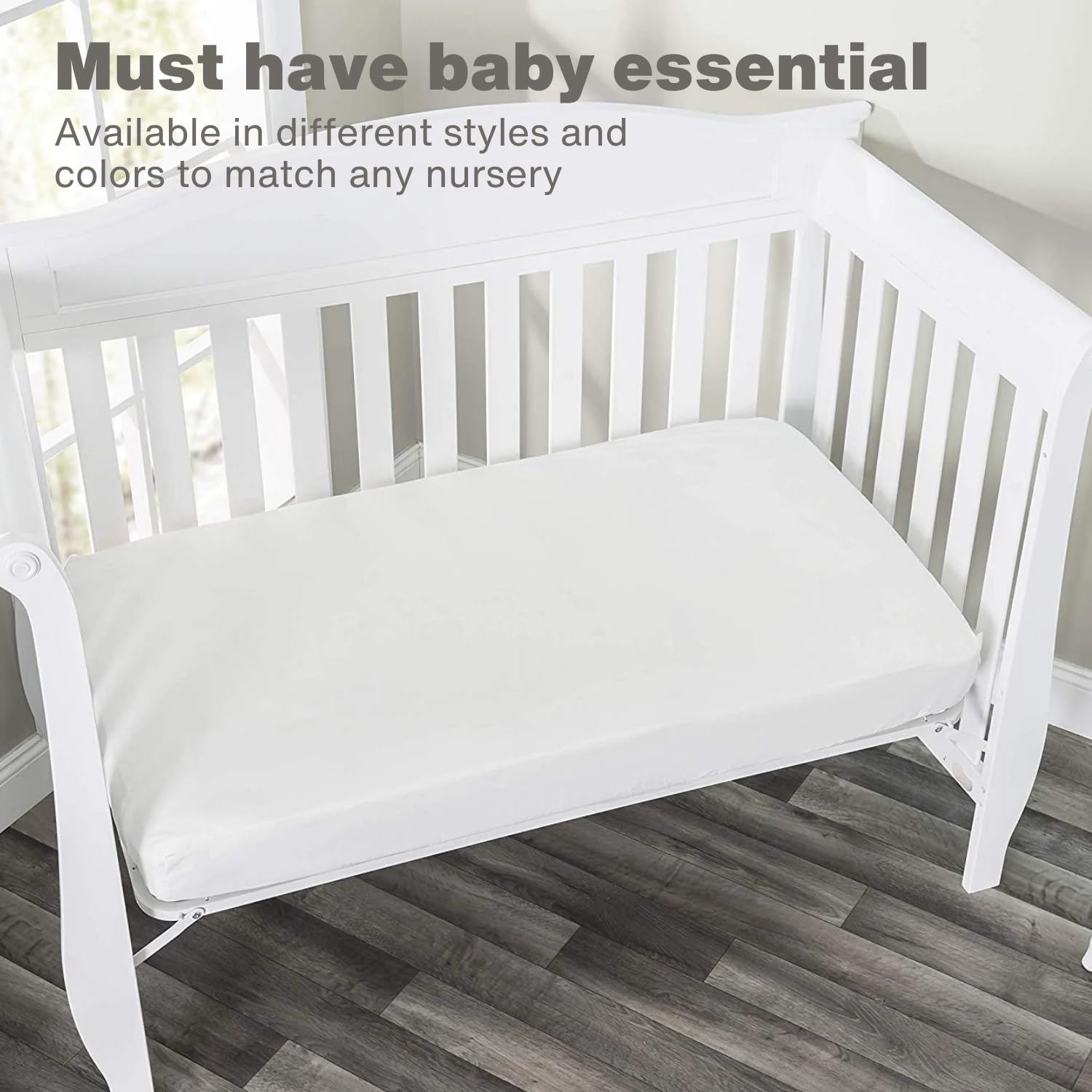 Everyday Kids navy sheet folded to illustrate snug crib fit.