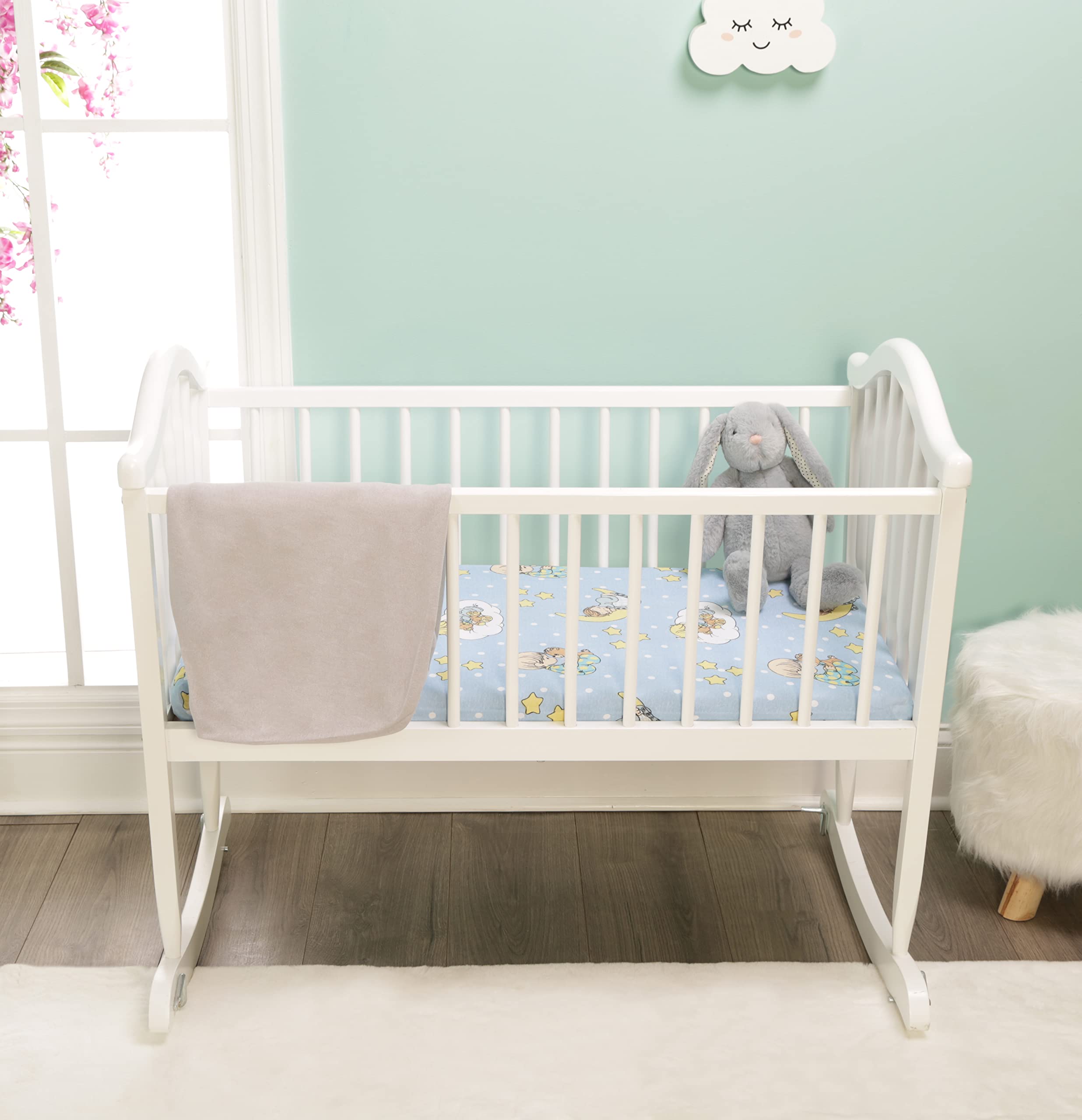 EVERYDAY KIDS 2-pack cradle sheets showcase coordinated set for versatile baby bedding.