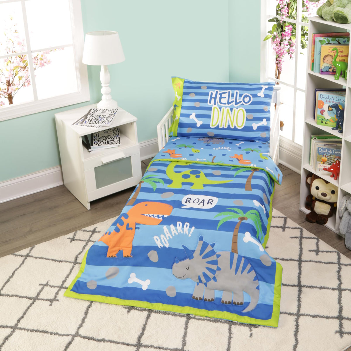 EVERYDAY KIDS roaring dinosaurs comforter for a cozy bedtime routine.