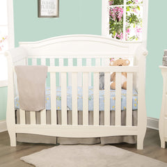 Everyday Kids solid gray crib sheet provides a versatile, fade-resistant base for nursery outfits.