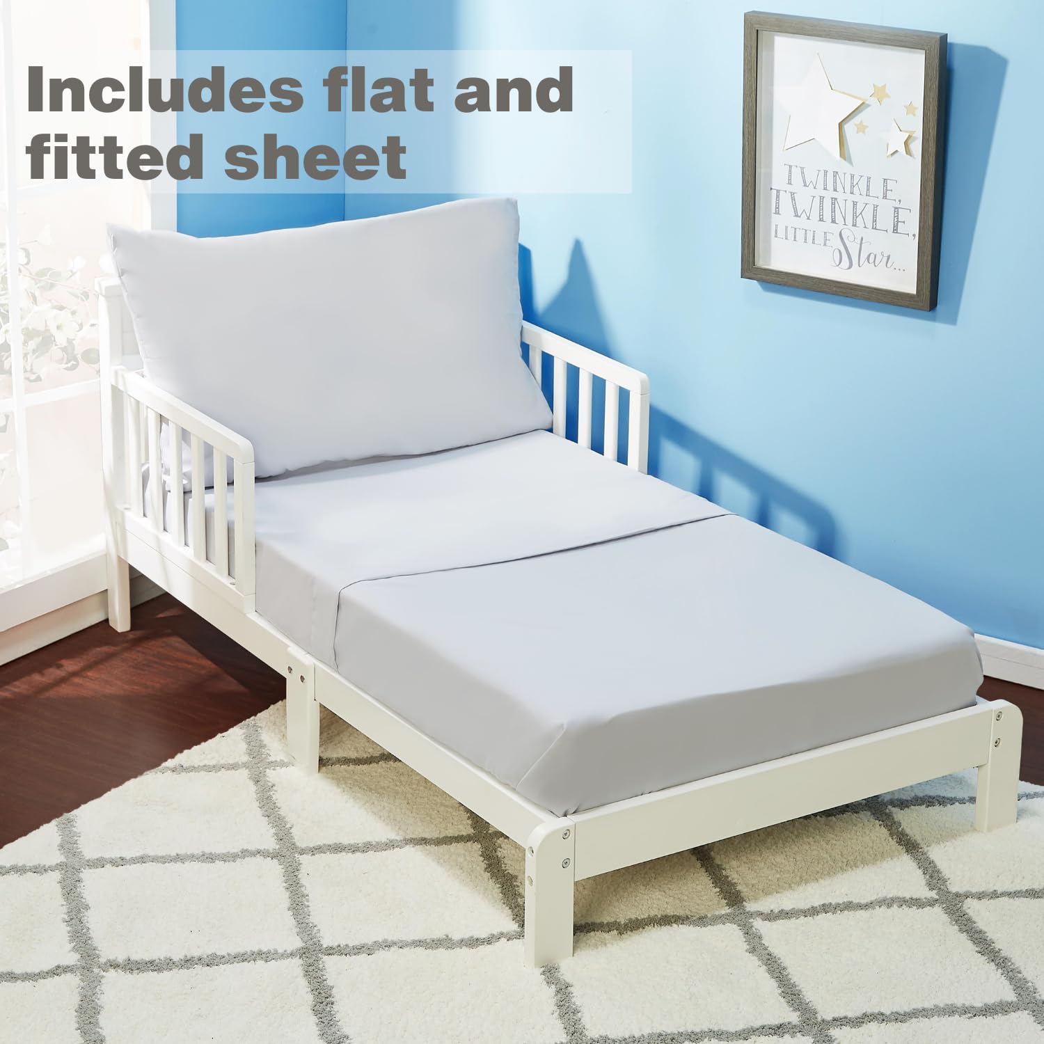 Everyday Kids solid grey fitted sheet on toddler bed with 8-inch pocket for secure fit.