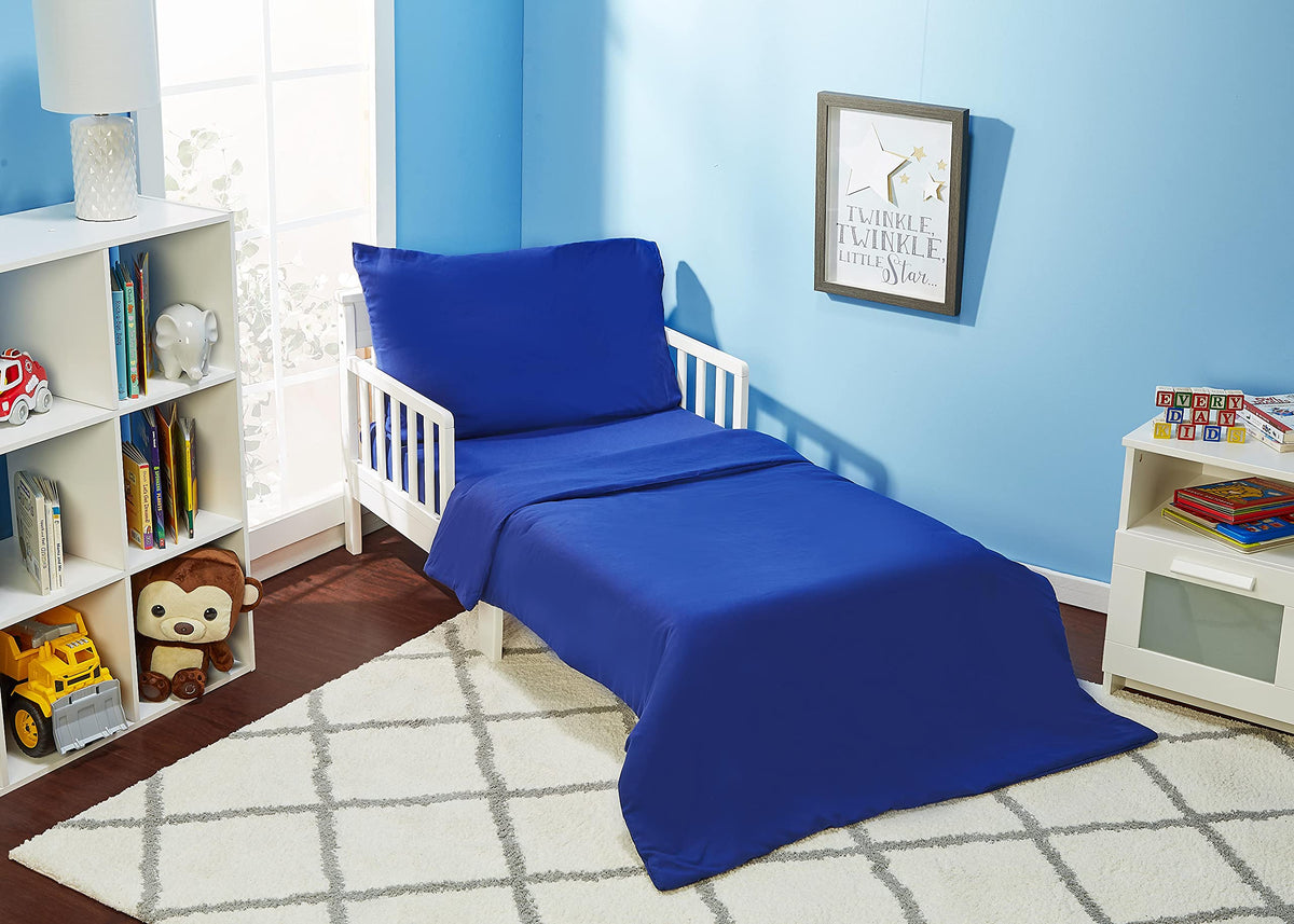Everyday Kids solid navy comforter image shows cozy bedtime feel
