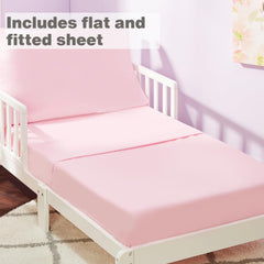 EVERYDAY KIDS solid pink fitted sheet demonstrates snug toddler mattress fit with durable elastic