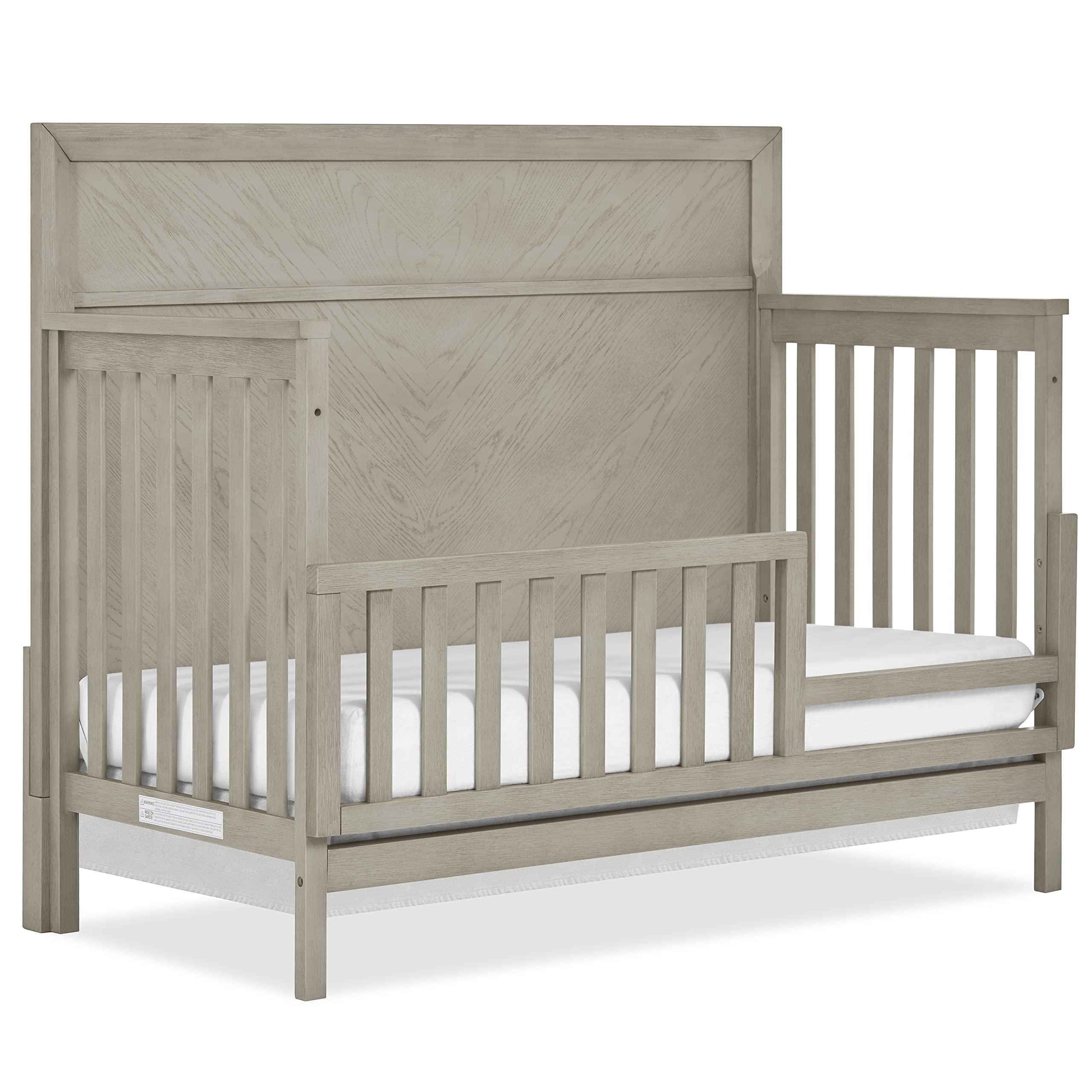 Evolur Lourdes guard rail on Porcini crib offers easy assembly for a secure toddler transition