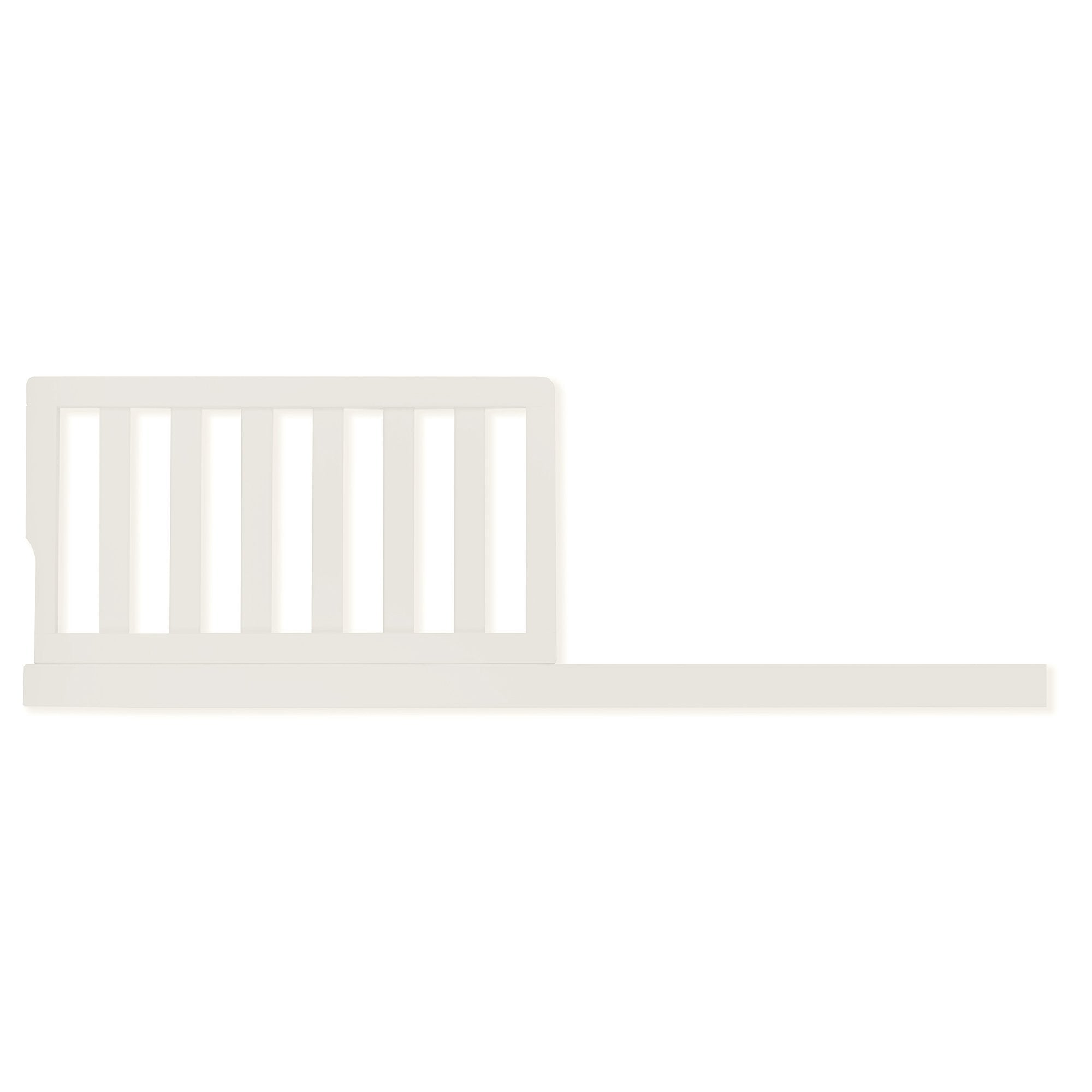 Evolur Toddler Guard Rail Ivory Lace attached to crib provides secure space during crib-to-bed transition.