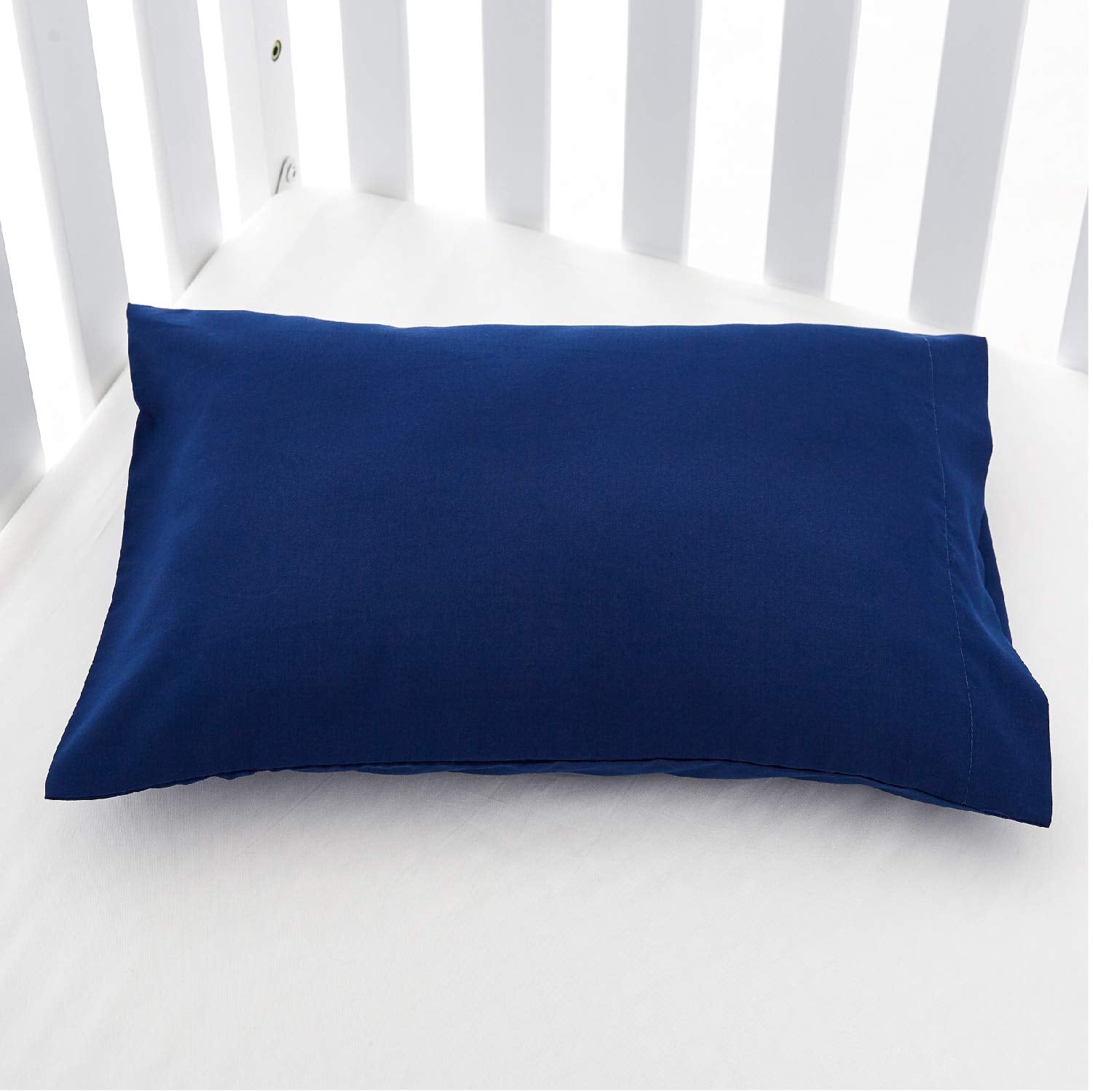 EXQ Home 2-pack navy pillowcases displayed for family trips and quick swaps