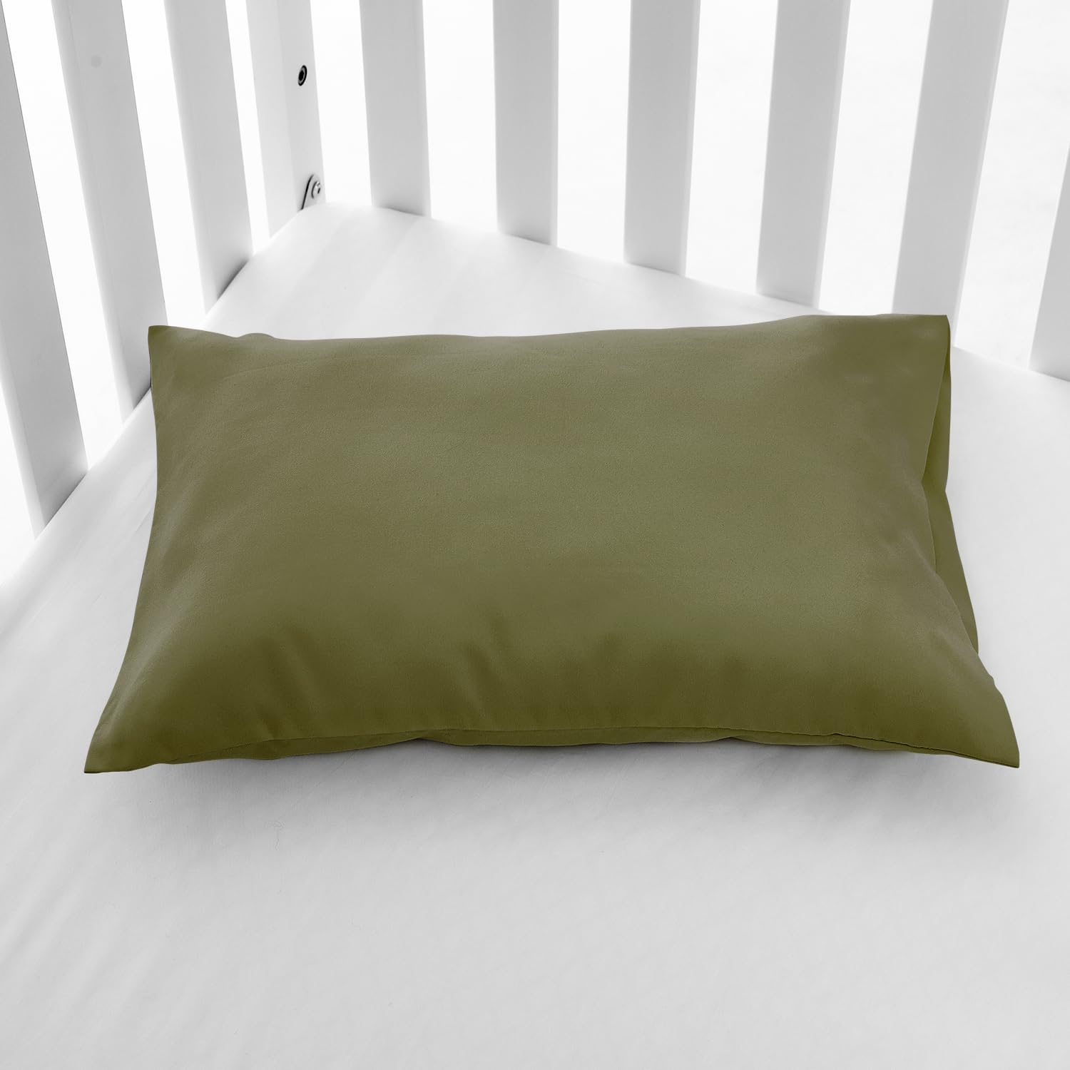 EXQ Home olive green pillowcase being machine washed highlights quick-dry care.