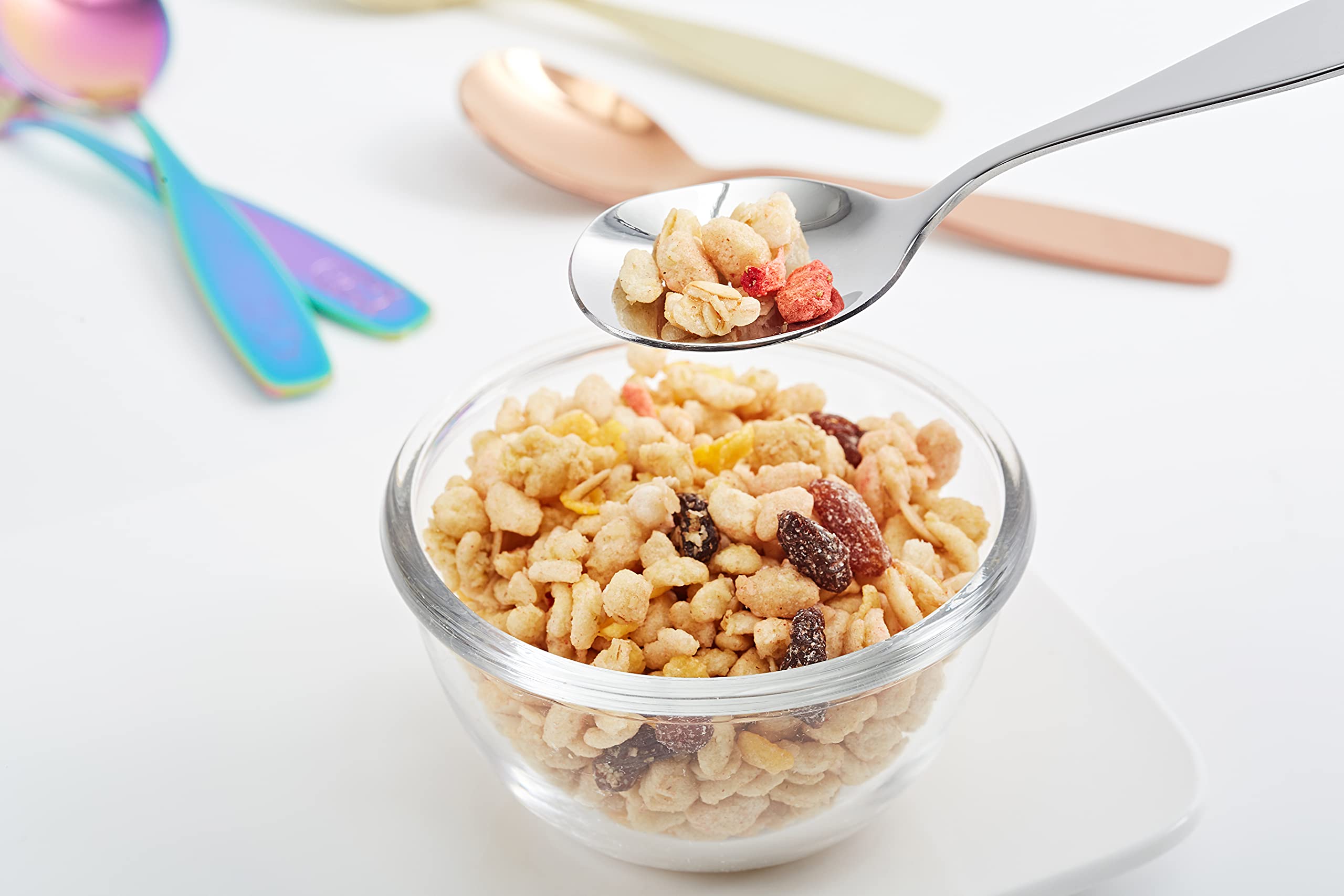 Exzact children's flatware includes two knives designed for safe cutting