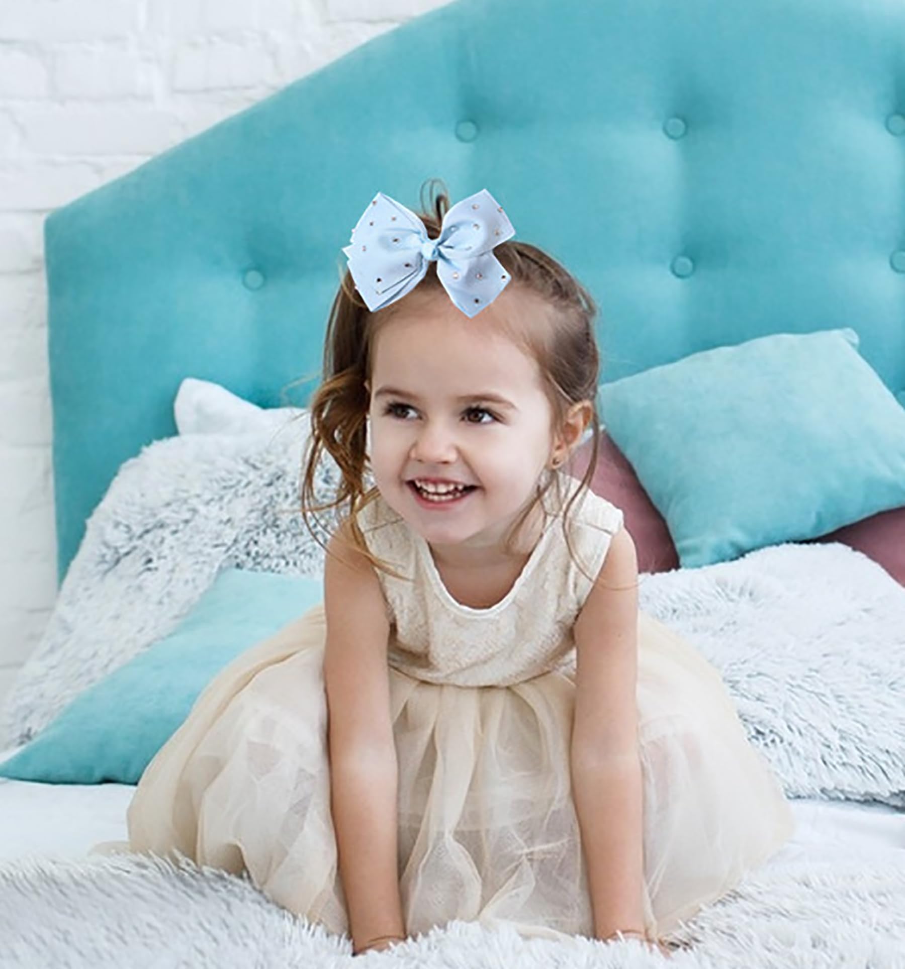 Eyegla 5-inch bows on a child’s head, cute accessory for toddlers to teens.