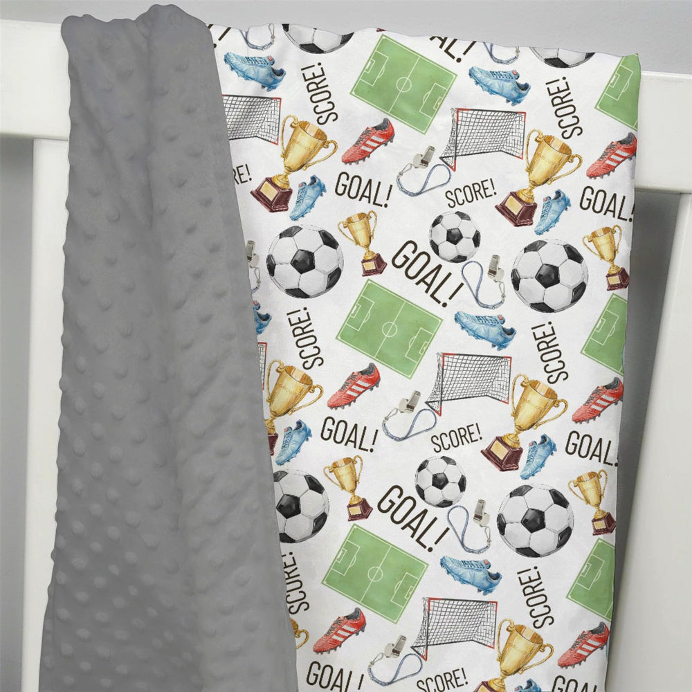 EyMzcod mink blanket nursery decor enhances a cozy, neutral sleep space.