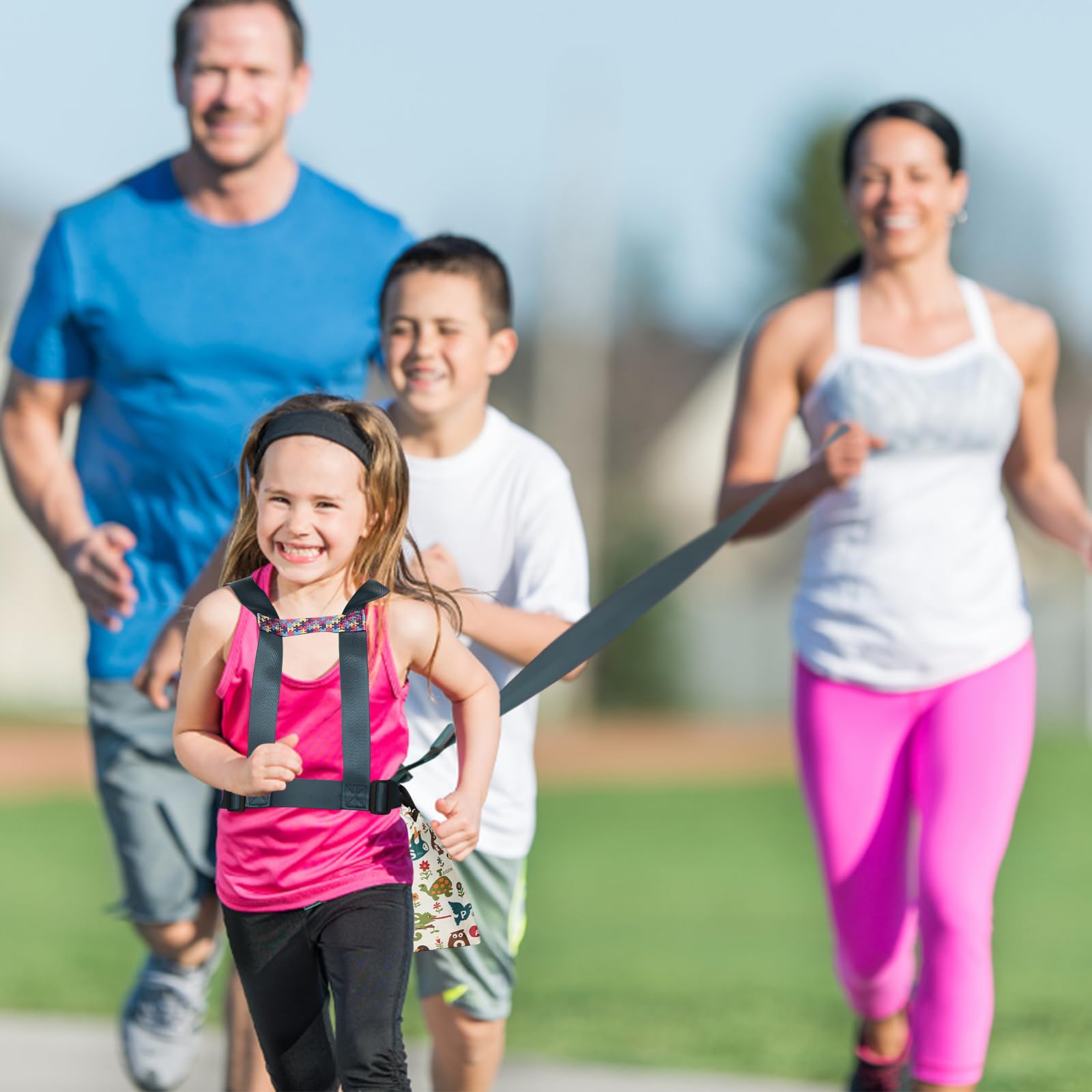 EZ4UVOY harness wear in park scene shows supportive supervision during outings.
