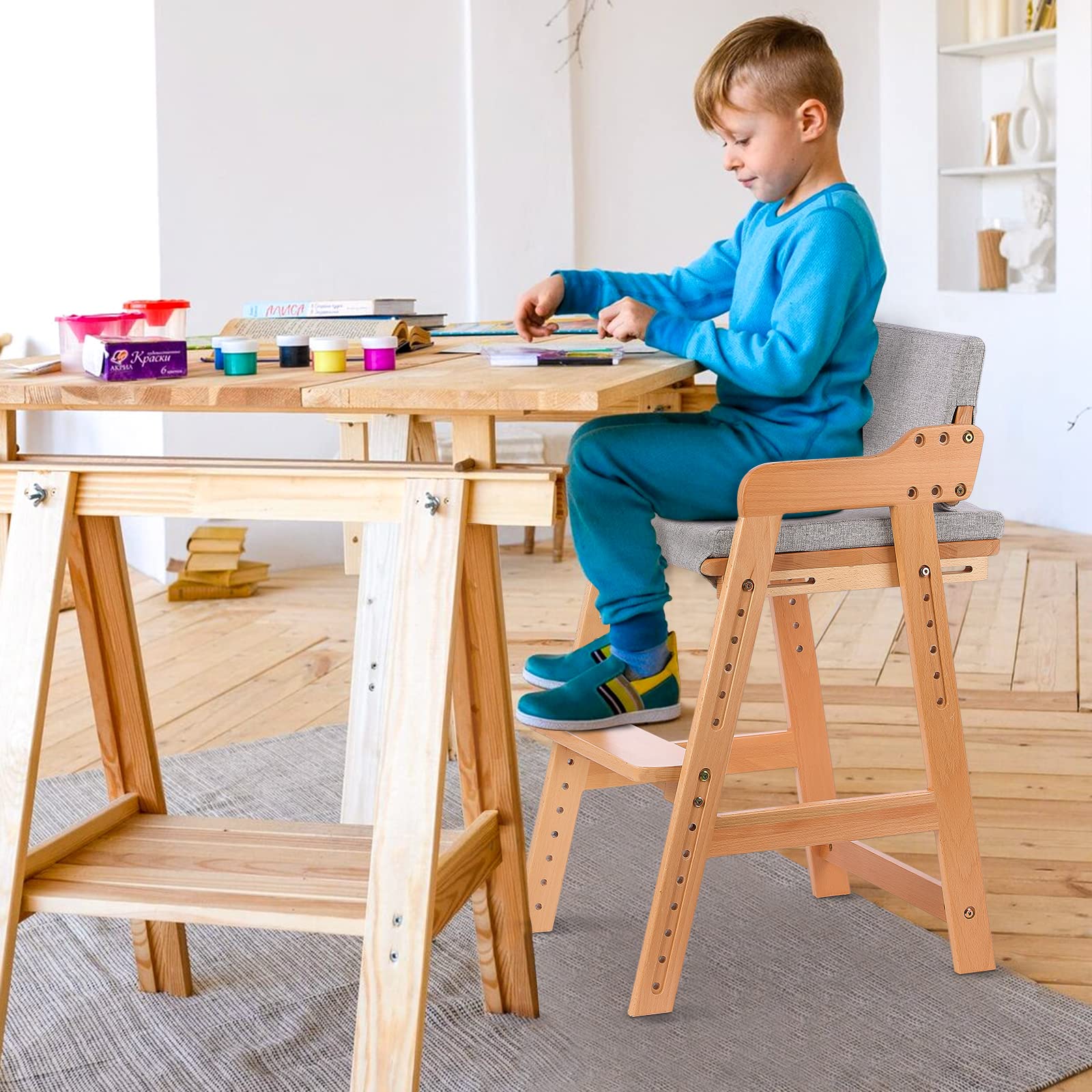 Ezebaby wooden high chair sturdy trapezoid structure for stability.