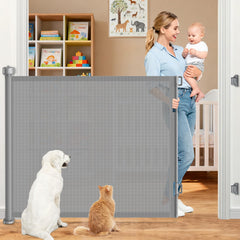 EZIGO 71inch retractable gate extended across a doorway showing wide coverage for kids and pets