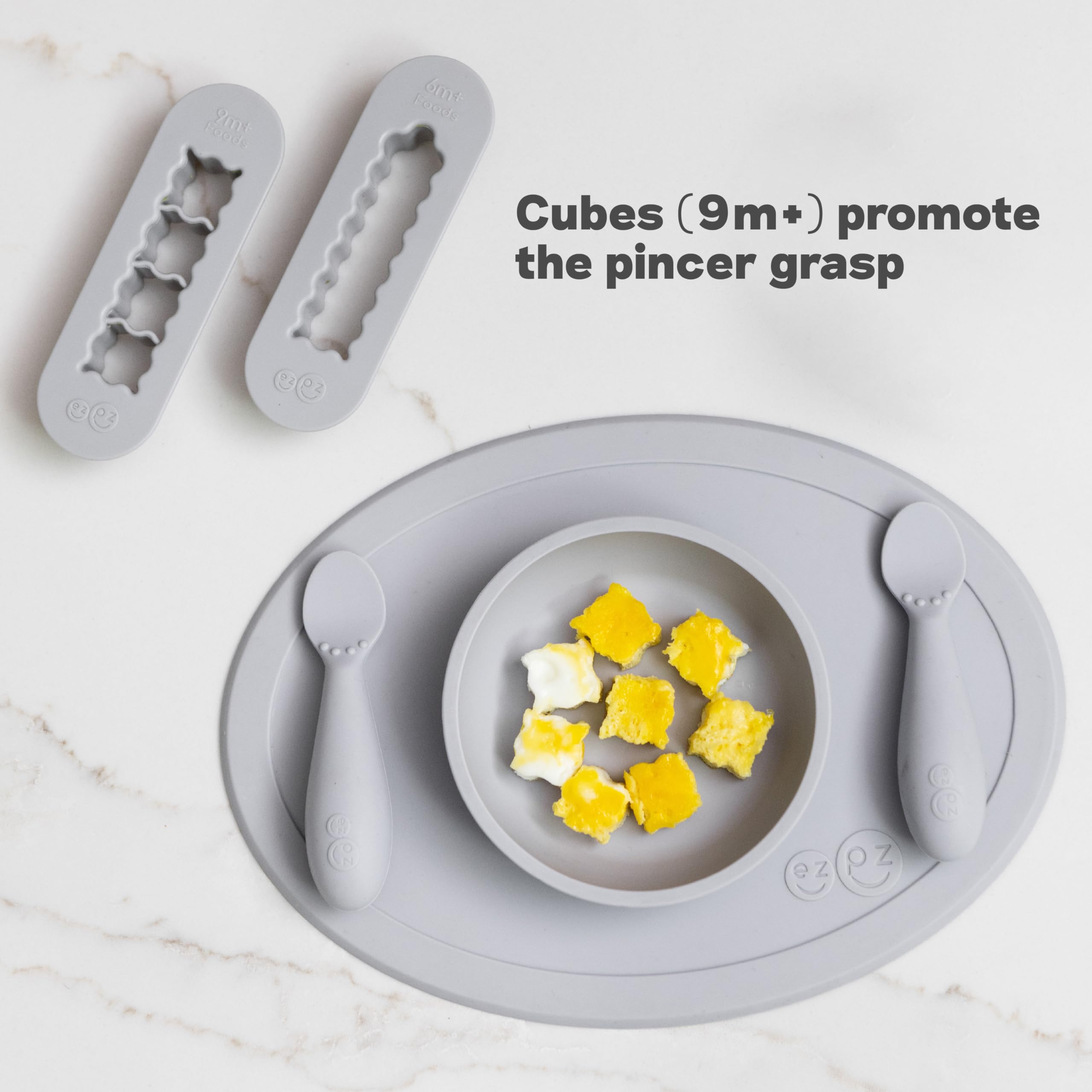 ezpz Baby-Led Weaning Cutters pewter in use shaping infant meals