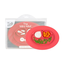 ezpz Mini Mat Coral with suction base helps minimize spills during feeding