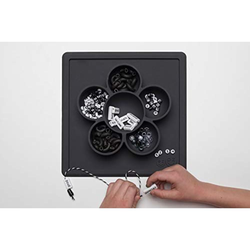 ezpz Mini Play Mat slate dishwasher-safe silicone material is easy to clean.
