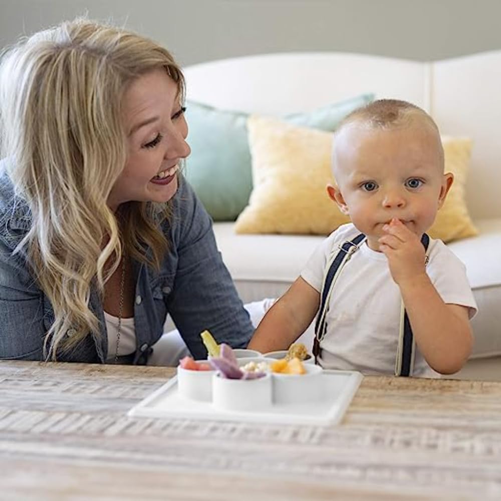 ezpz Mini Play Mat slate promotes pincer-grasp with flower compartments.