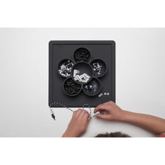 ezpz Mini Play Mat slate snack-time setup reduces mess and spills.