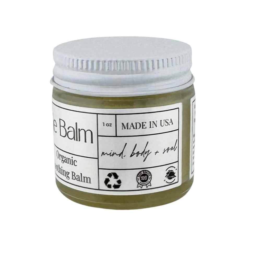 Faith and Grace Organics calendula-infused olive oil bottle highlights natural nourishing base.