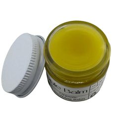 Faith and Grace Organics Nourish Nipple Balm ingredients featuring calendula-infused oil.