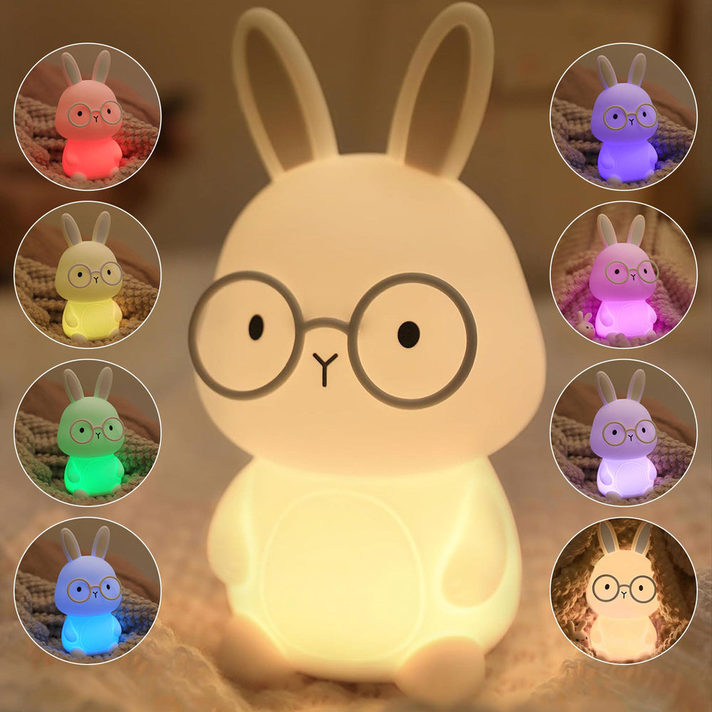 Famiduo bunny night light glowing softly on a kid's bedside table for bedtime comfort.