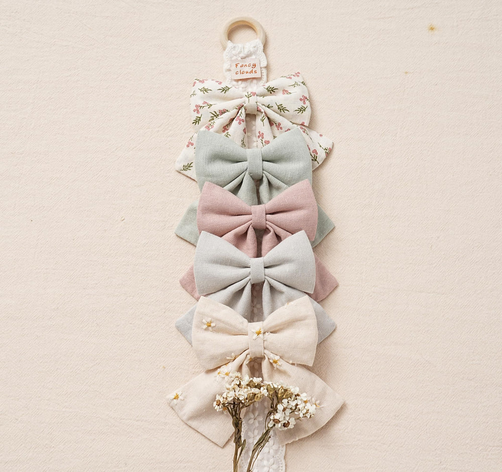 Fancy Clouds 5-color bow set supports school outfits and photo days.