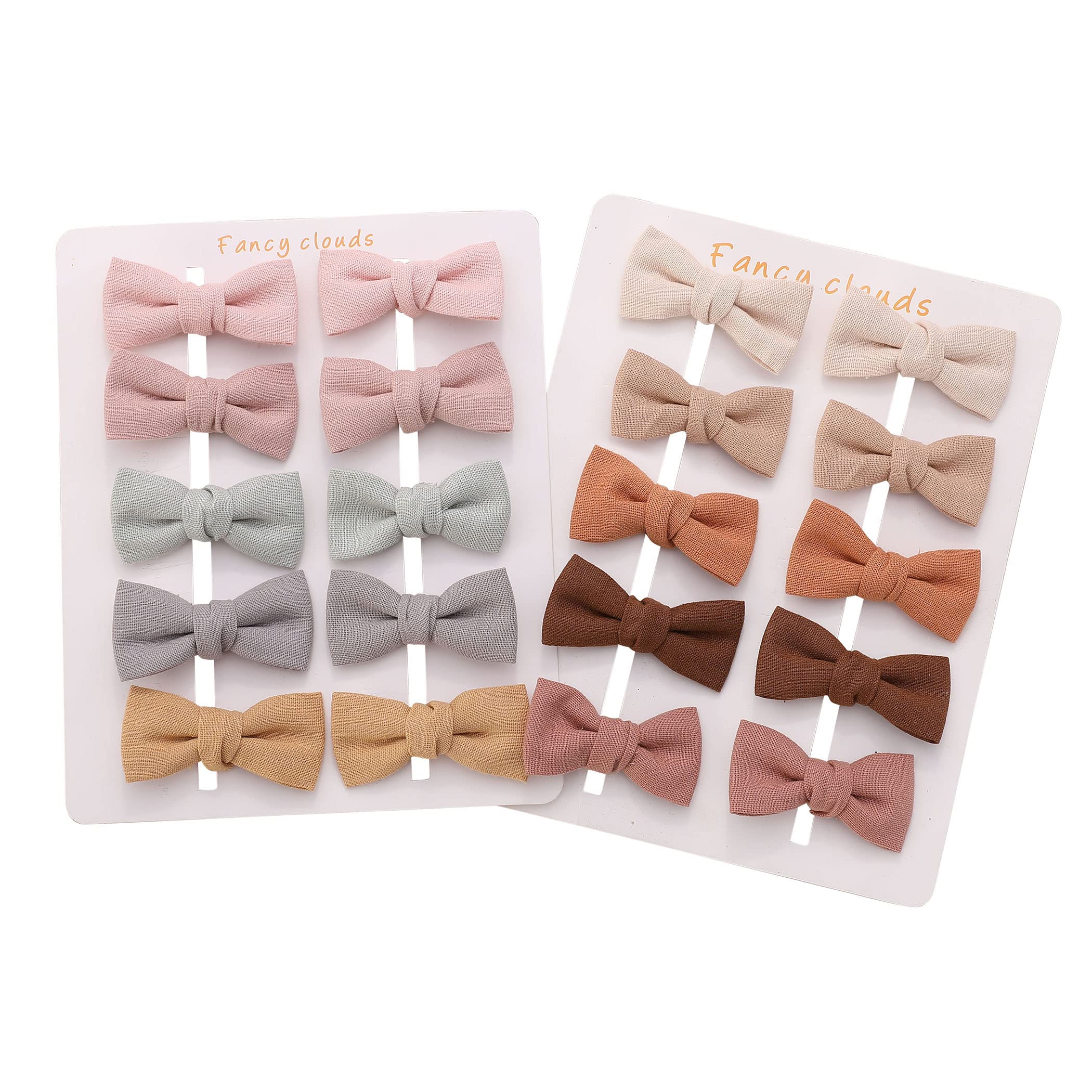 Fancy Clouds baby hair clips in a neutral color palette for easy everyday outfits.