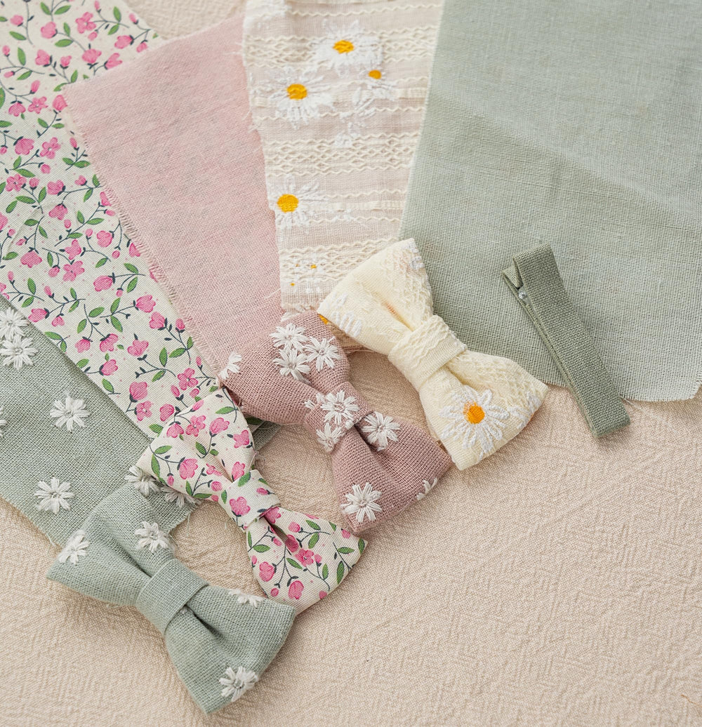 Fancy Clouds lace bow holder keeps accessories organized and accessible.