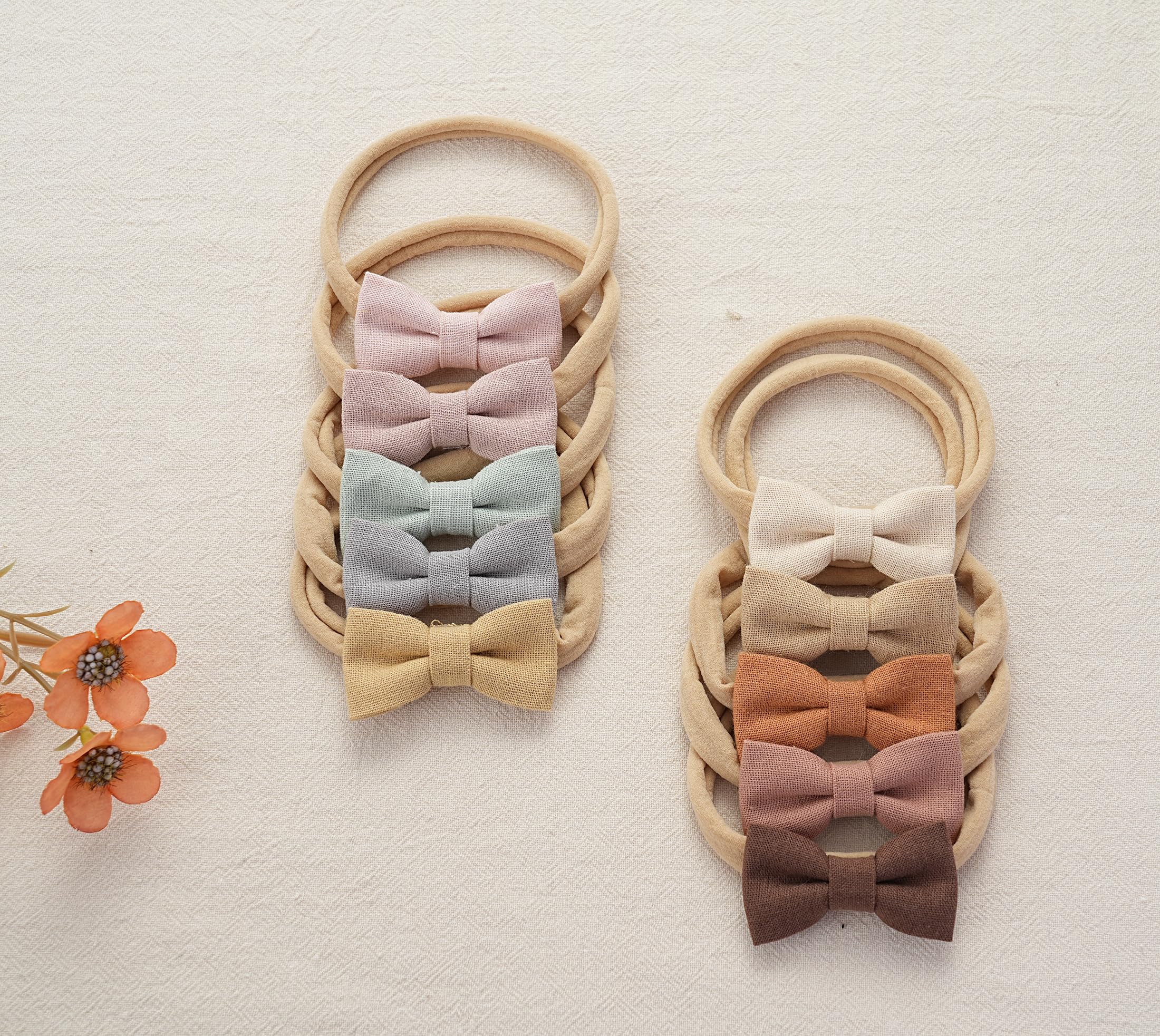 Fancy Clouds bows on a baby's head demonstrating secure fit during play