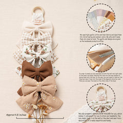 Fancy Clouds embroidery detail bows highlight delicate stitching for a charming girls' look.