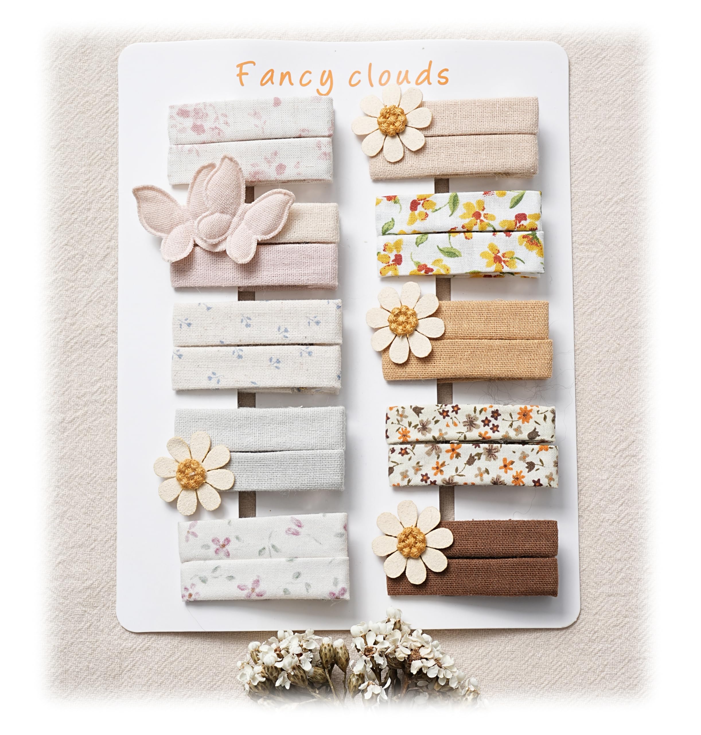 Fancy Clouds flower butterfly hair clip close-up showing gentle fabric finish for fine hair.