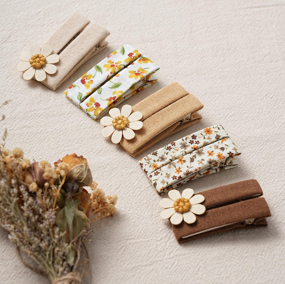 Fancy Clouds 1.8-inch clip fully fabric-covered for comfortable all-day wear.