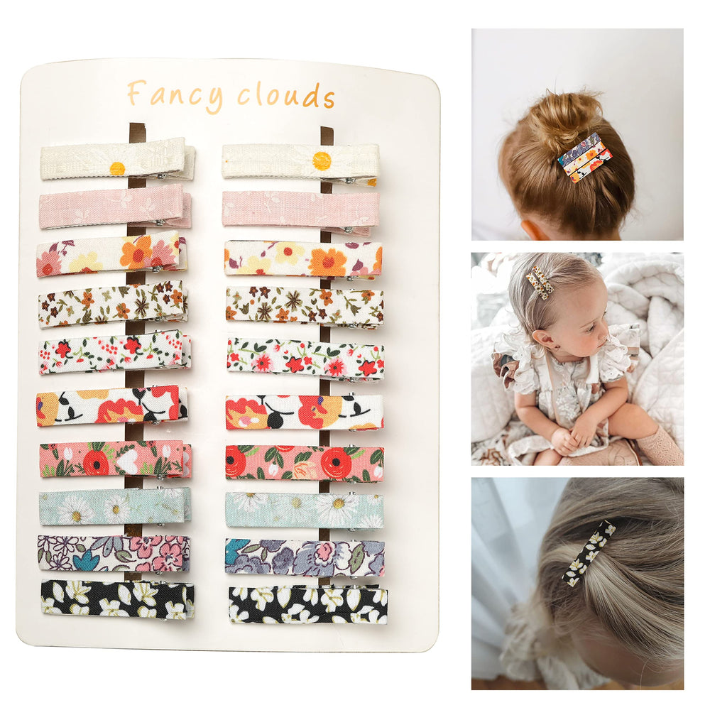 Fancy Clouds hair clip with a daisy pattern provides secure fabric-covered grip for all-day wear.