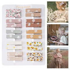 Fancy Clouds flower-pattern clips with fabric lining provide secure grip for all ages