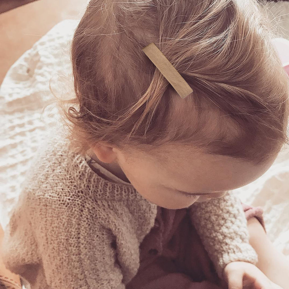 Handmade by a family, Fancy Clouds barrettes add elegance