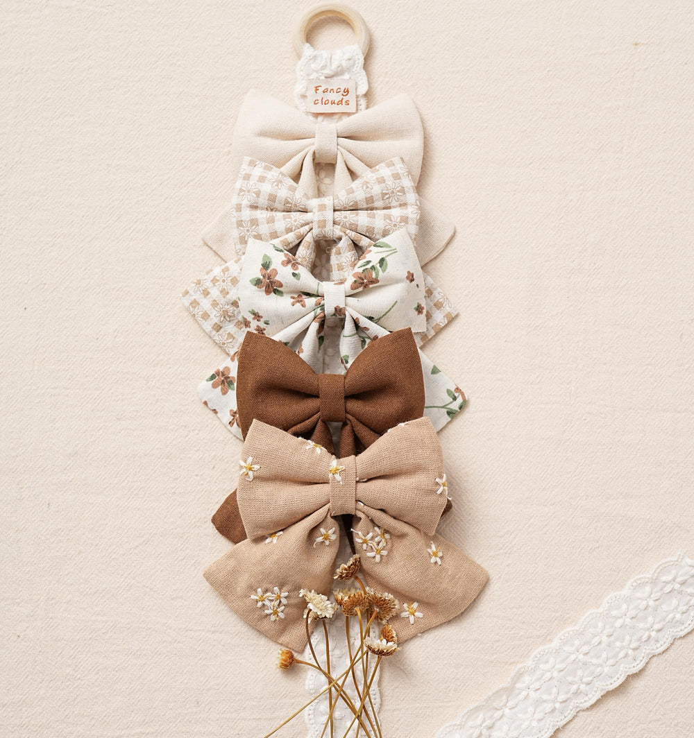 Fancy Clouds handmade bows showcase craftsmanship and careful stitching.