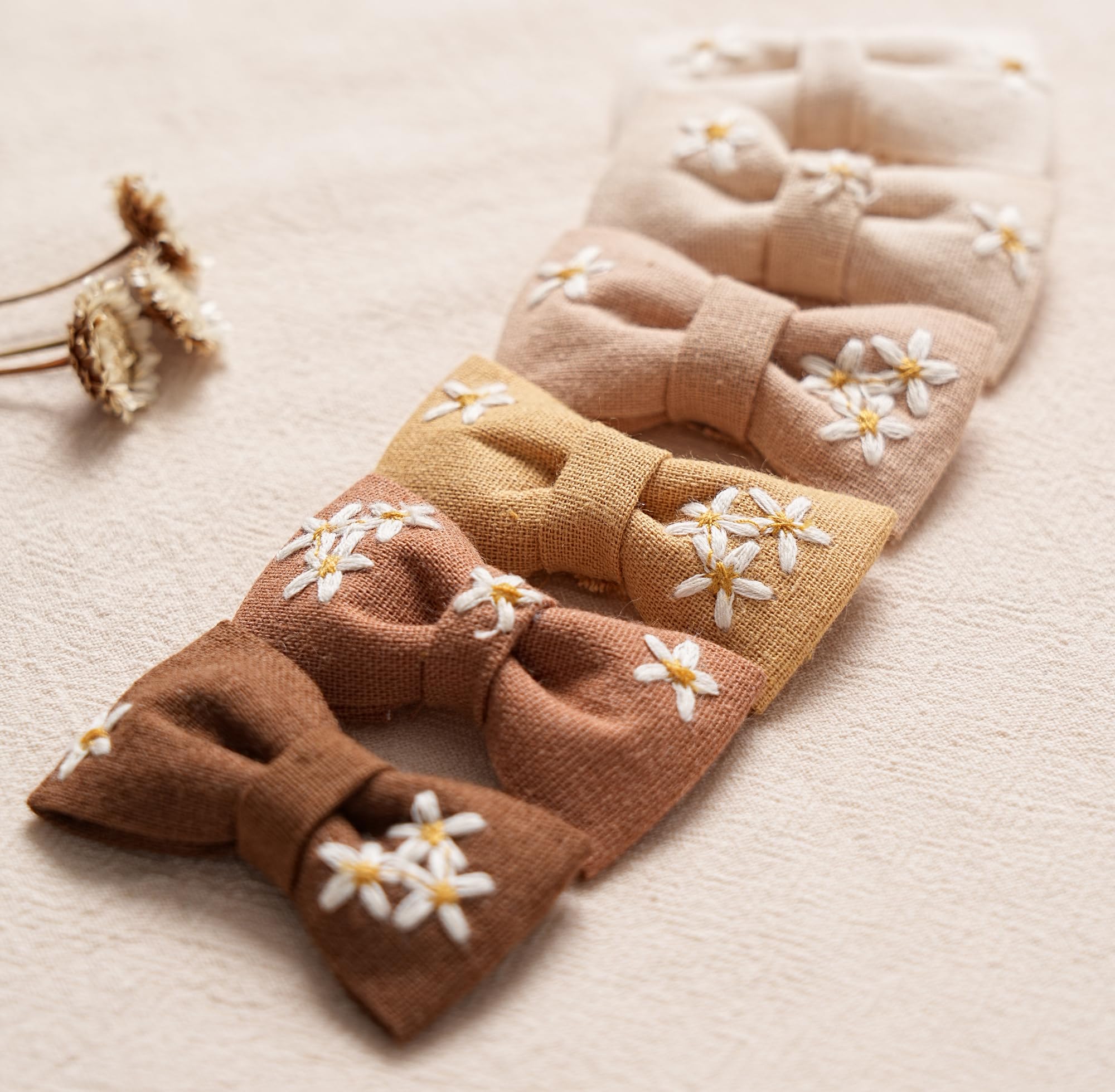 Fancy Clouds handmade daisy embroidery close-up showcases craftsmanship