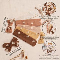 Fancy Clouds nylon headbands with soft stretch for gentle, growing fit.