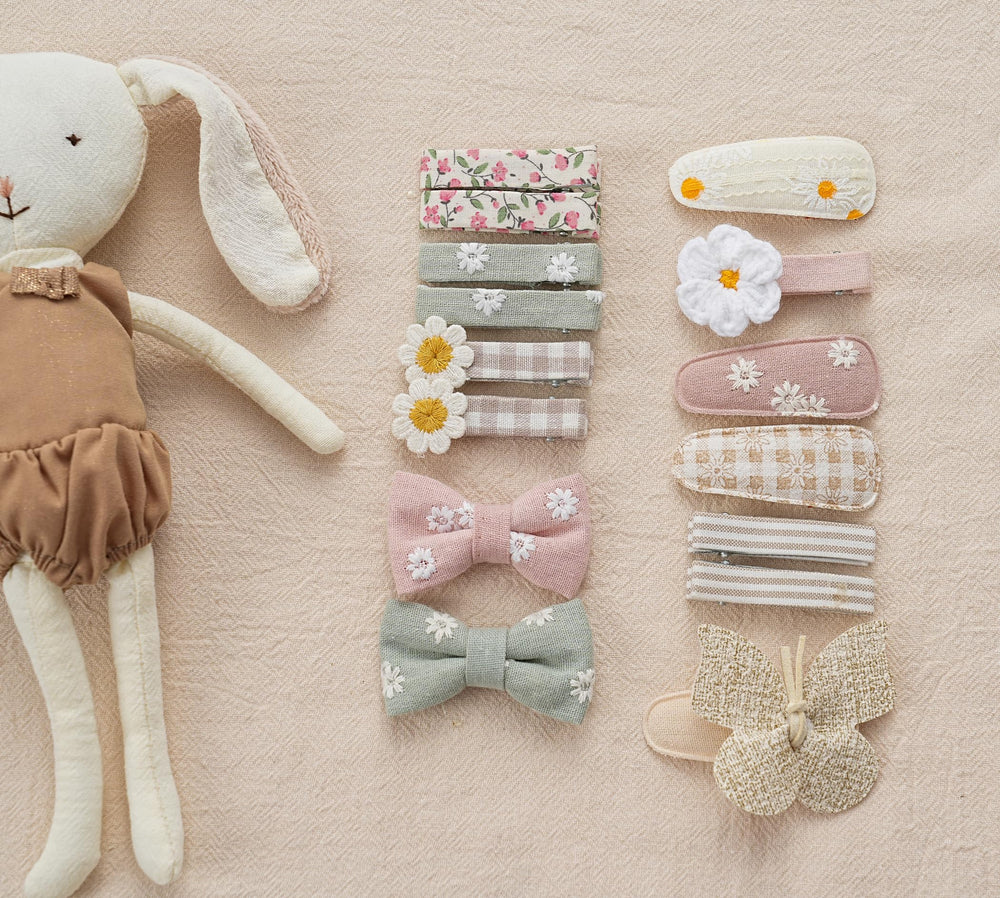 Fancy Clouds linen and cotton covered barrettes offer soft touch, child-friendly comfort.