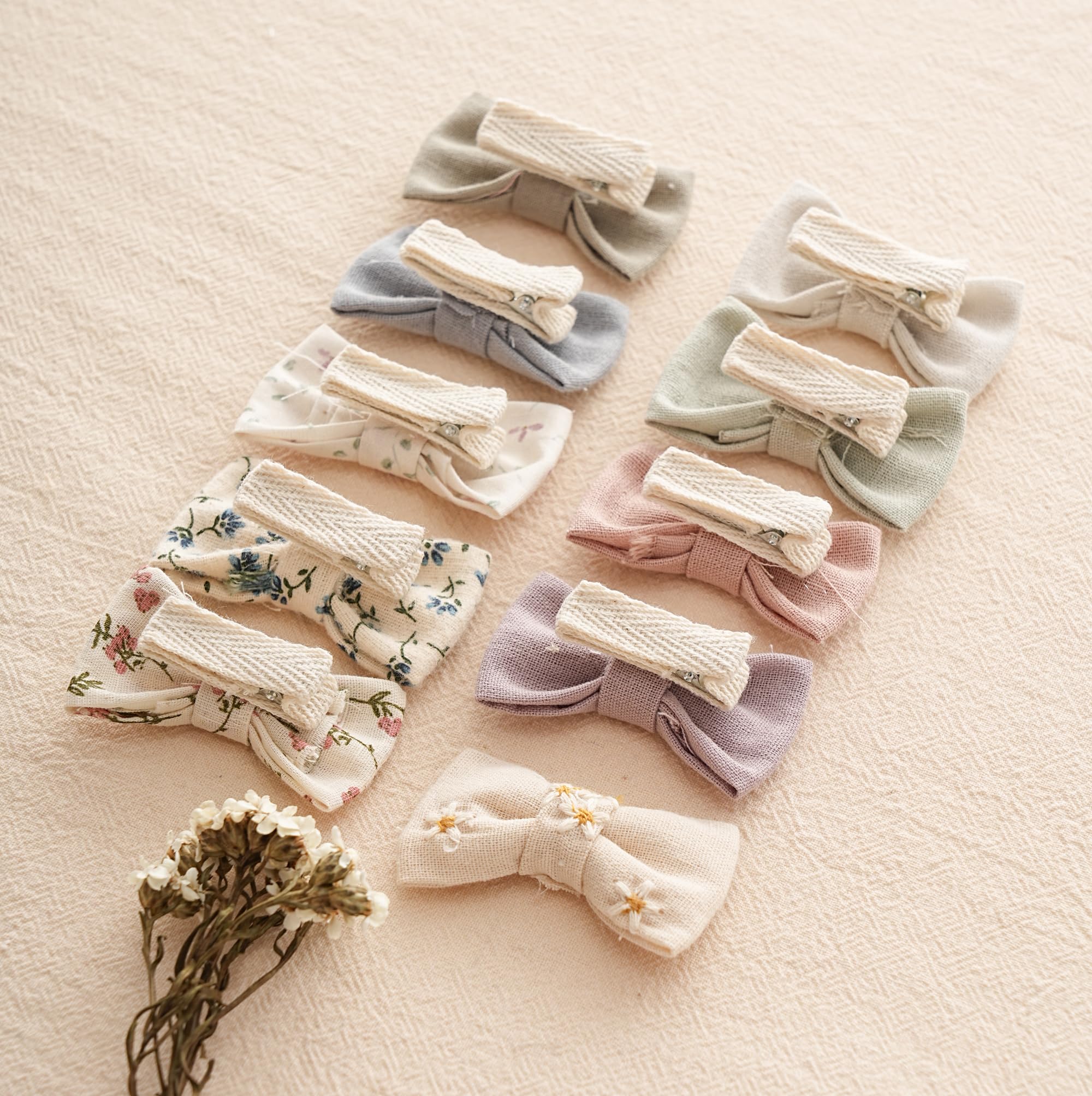 Fancy Clouds linen-wrapped clip closeup with safe, gentle contact on tiny scalps