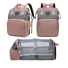 Fandiar diaper bag changing station setup with organized baby essentials on the go.
