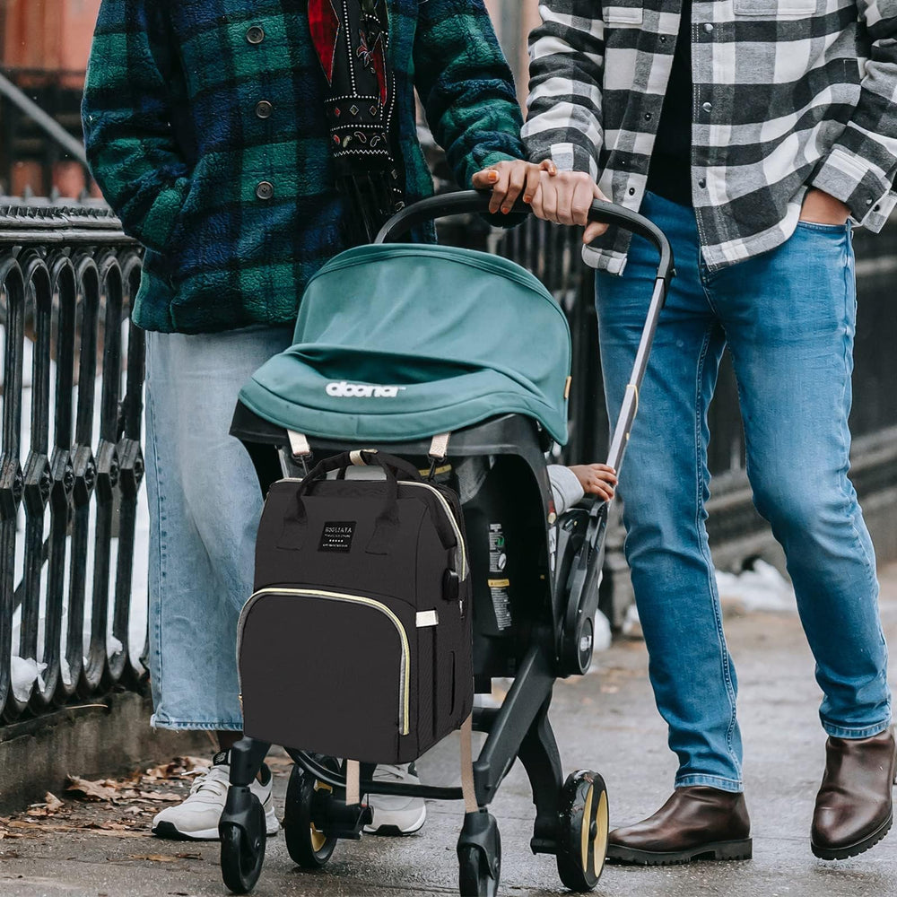 Fandiar diaper bag in use with baby essentials during travel