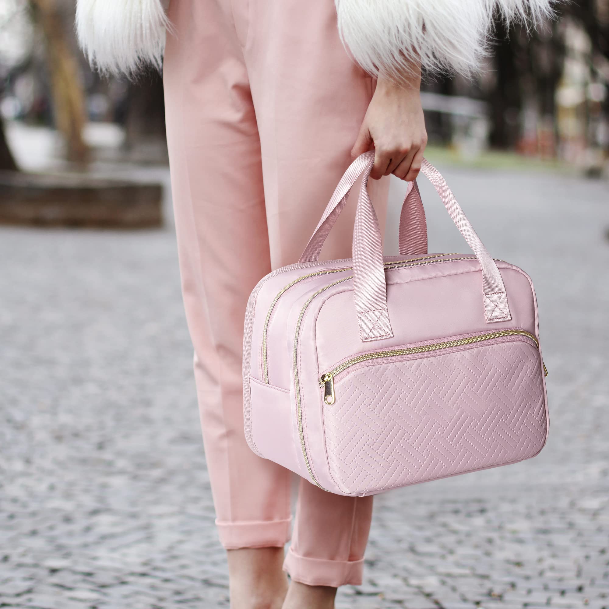 Fasrom pink compact size fits a busy mom's bag lineup.